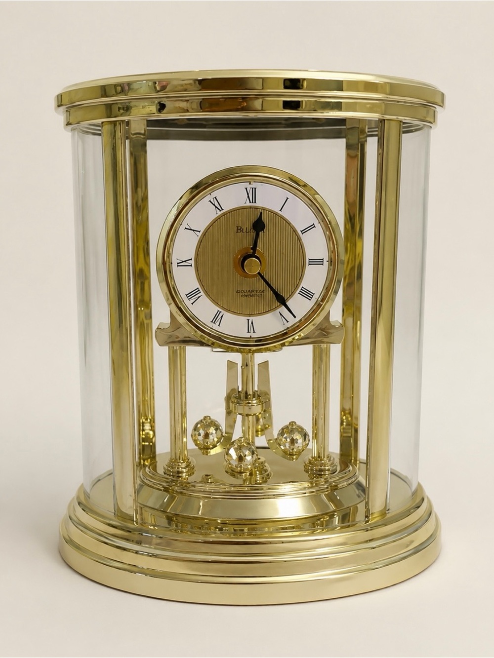 Bulova Brass-Tone Rotating Pendulum Mantel Clock